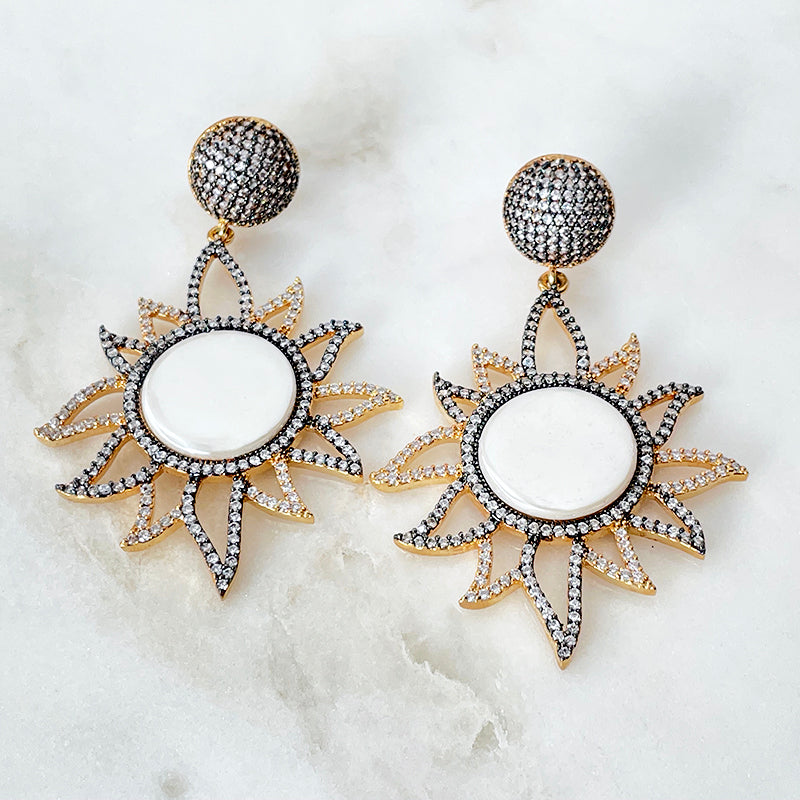Pave sun mother of pearl earrings